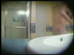 A spy webcam video was captured in the restroom as my ex-wife was doing the laundry.